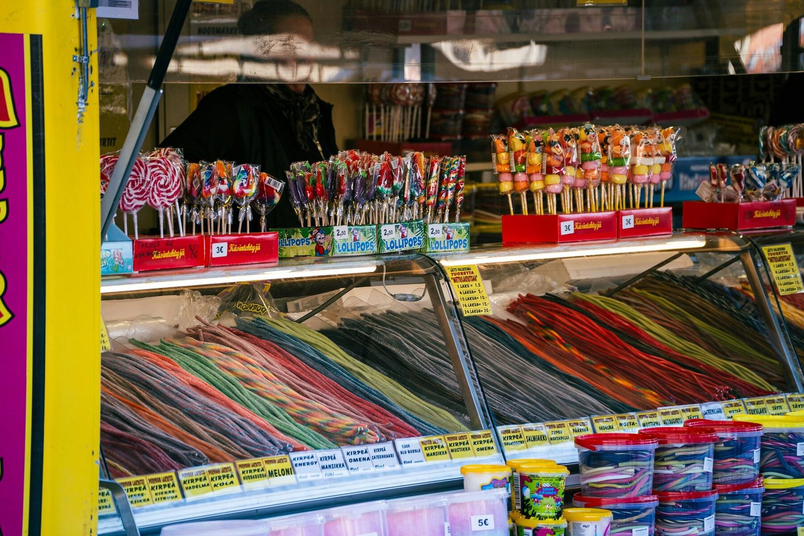 Colourful Finnish candy market stall with lollipops and liquorice